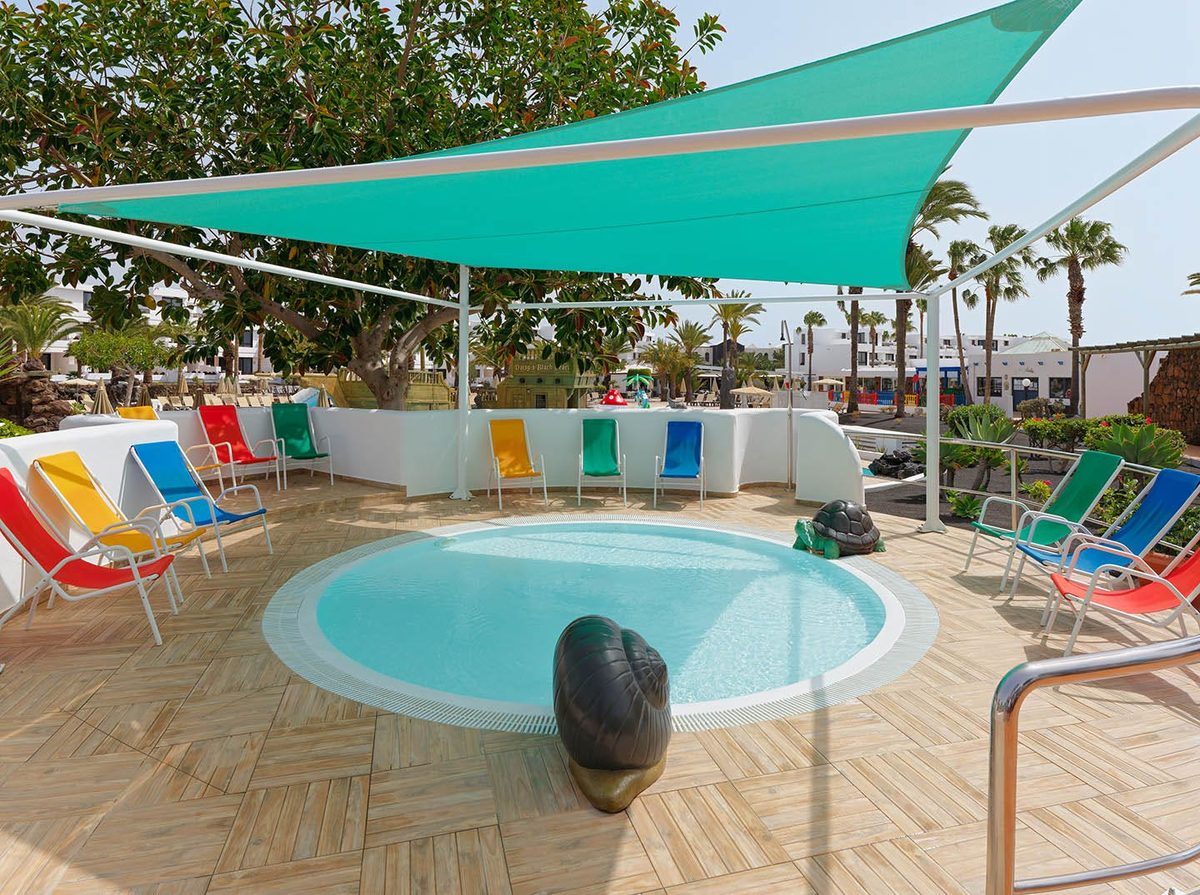 The pirate-ship splash pool with slides and mushroom fountains